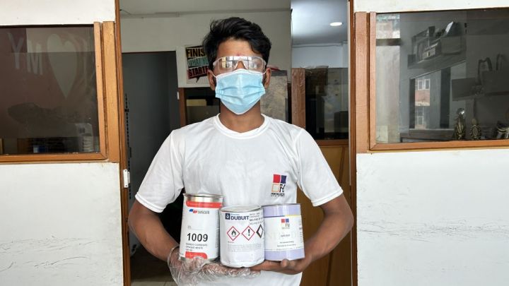 Color-Chemist-Holding-Inks-of-Printin-Decor